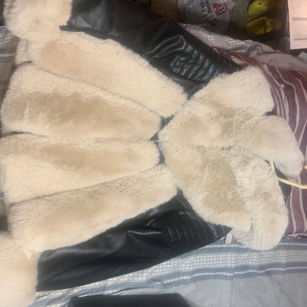 Brand new only worn once. Synthetic fur coat.—size medium .